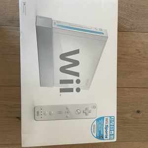 Wii console with accessories and games